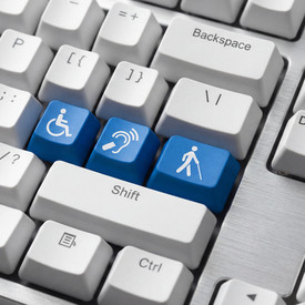 Symbolbild für Barrierefreiheit: Tastatur mit drei besonderen Tasten für Menschen mit Behinderung